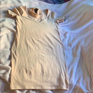 Peach colored choker dress.